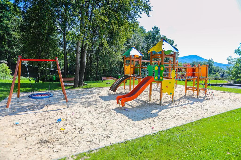 Hotel Belweder Ustron Luaran gambar Playground in the village