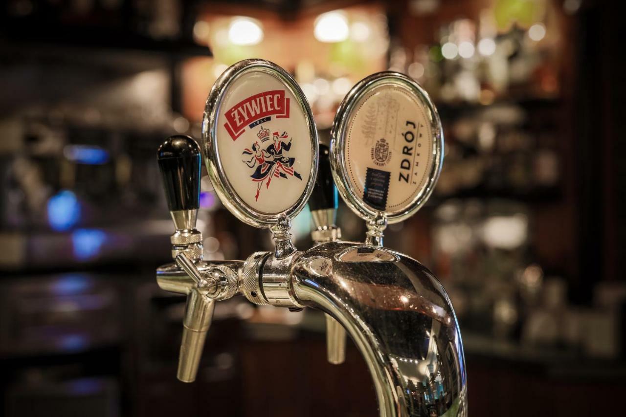 Hotel Belweder Ustron Luaran gambar Beer taps in a restaurant